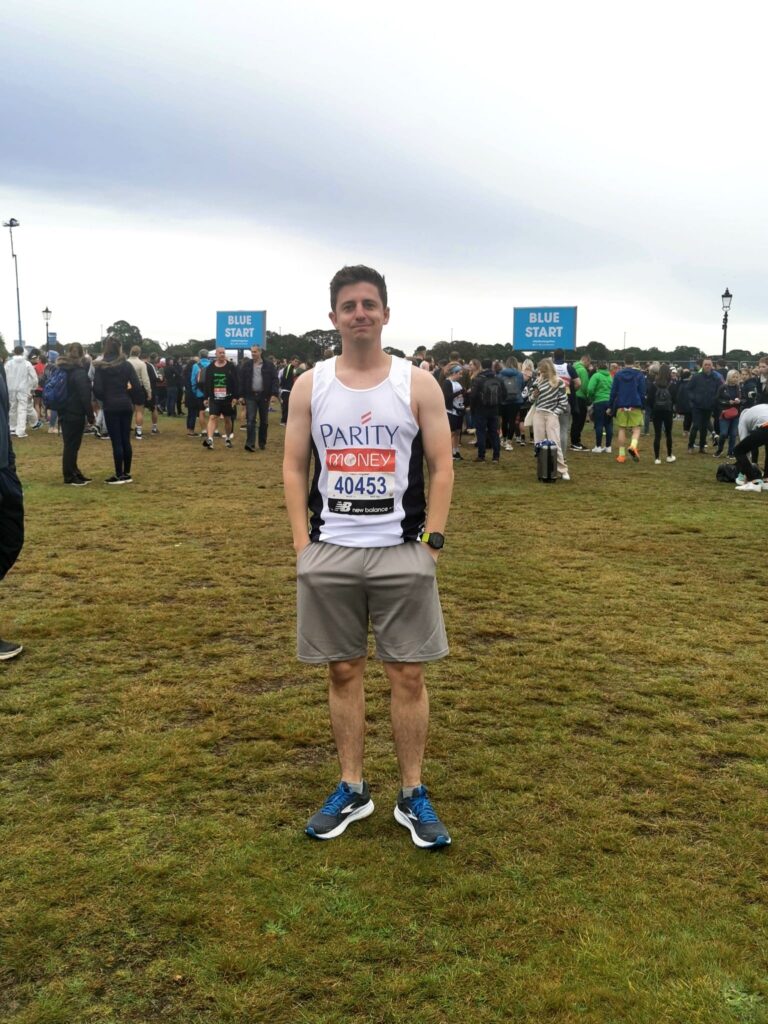 London marathon runner 2021 standing in his Parity T shirt before the event