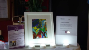 A student's framed Paralympics art on displaya