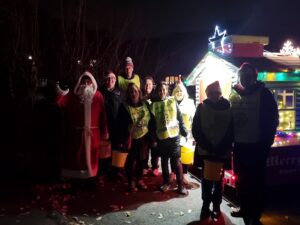 Our collection volunteers with the Santa Sleigh